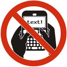 Distracted Driving Awareness Month 2015 (no texting sign)