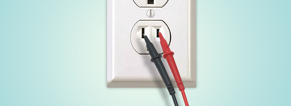 Place the red probe in the “V”